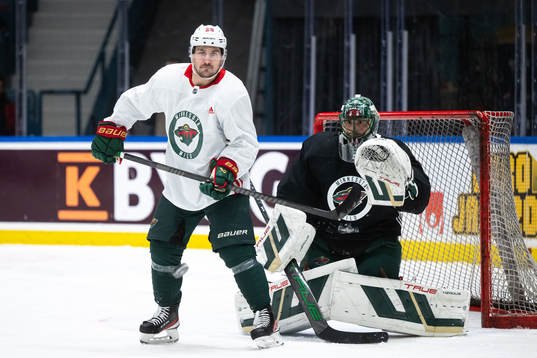 Mats Zuccarello and goaltender Marc-Andre Fleury of