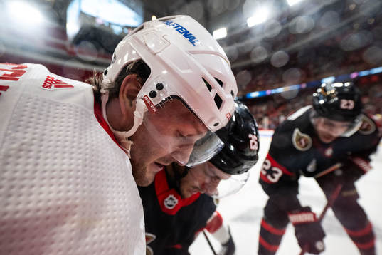 Christian Fischer of Detroit Red Wings and Erik