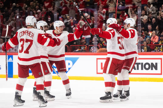 David Perron of Detroit Red Wings celebrates with team mates