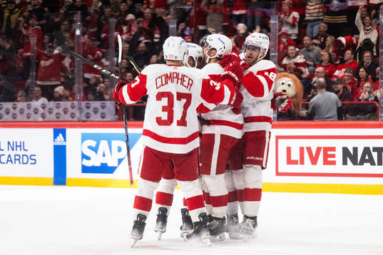 David Perron of Detroit Red Wings celebrates with team mates
