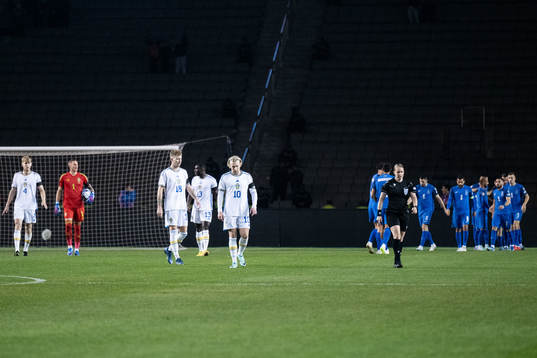 Samuel Gustafson and Emil Forsberg of Sweden look dejected