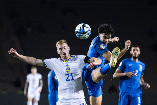 Dejan Kulusevski of Sweden and Bahlul Mustafazade of