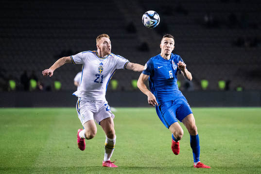Dejan Kulusevski of Sweden and Anton Krivotsyuk of