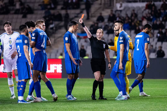 Bahlul Mustafazade of Azerbaijan receives a red card