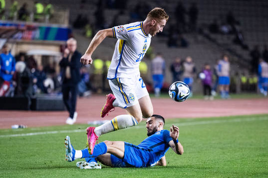 Dejan Kulusevski of Sweden and Elvin Jafarguliyev of
