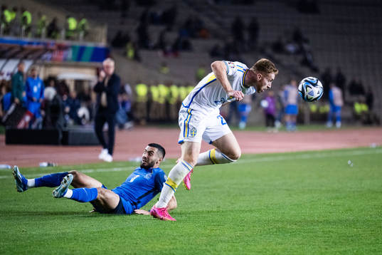 Dejan Kulusevski of Sweden and Elvin Jafarguliyev of