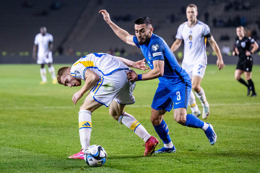 Dejan Kulusevski of Sweden and Elvin Jafarguliyev of