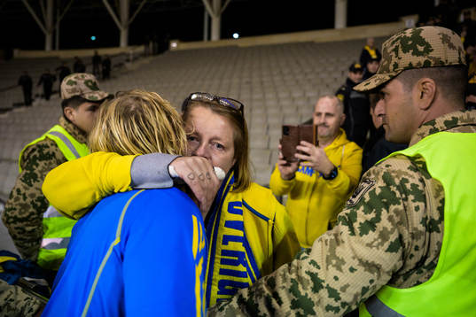 Emil Forsberg of Sweden hugs Swedish supporter Lisen Altis,