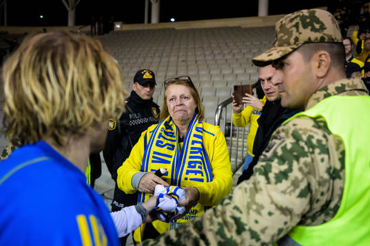 Emil Forsberg of Sweden hands over a jersey to Swedish
