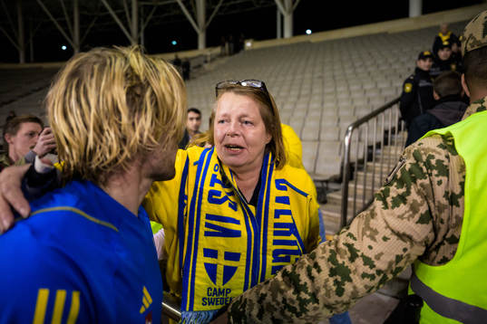 Emil Forsberg of Sweden hugs Swedish supporter Lisen Altis,