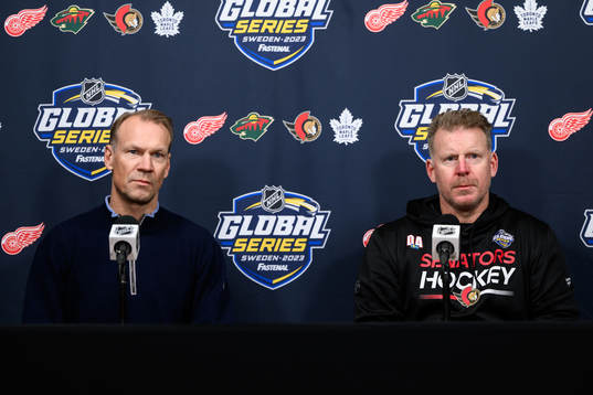 Niklas Lidström of Detroit Red Wings and Daniel Alfredsson