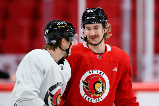 Parker Kelly and Jake Sanderson of Ottawa Senators