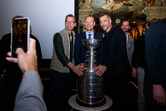 Nicklas Lidström pose for a photo with the Stanley Cup as