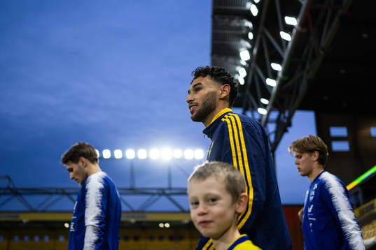 Joakim Persson of Sweden enters the pitch