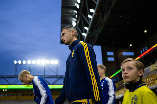 Noah Eile of Sweden enters the pitch