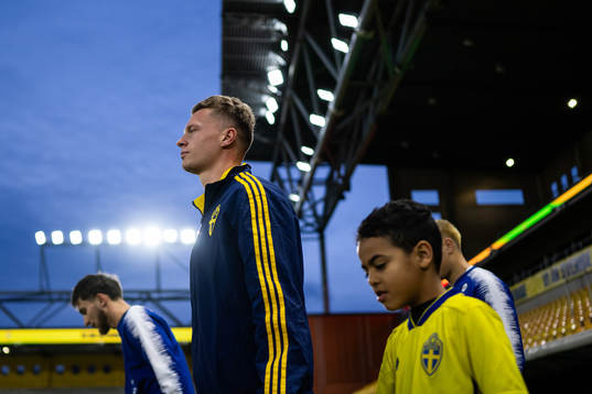 Joel Voelkerling Persson of Sweden enters the pitch