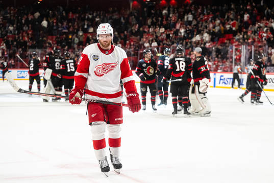 T Compher of Detroit Red Wings looks dejected