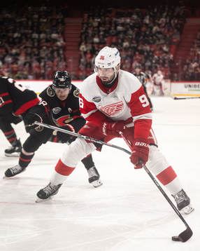 Tim Stützle of Ottawa Senators and Jake Walman of Detroit