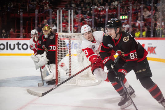 Moritz Seider of Detroit Red Wings and Jake Sanderson of