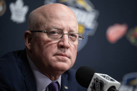 Deputy Commissioner Bill Daly of NHL at a press conference