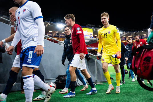 David Møller Wolfe and goalkeeper Mathias Dyngeland of