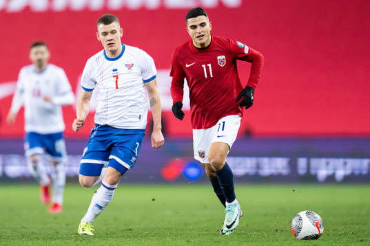 Joannes Bjartalio of Faroe Islands and Mohamed Elyounoussi
