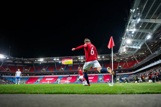 Patrick Berg of Norway takes a corner kick