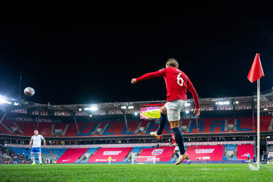 Patrick Berg of Norway takes a corner kick