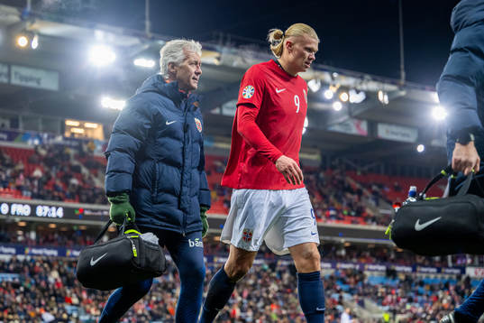 Doctor Ola Sand and Erling Braut Haaland of Norway