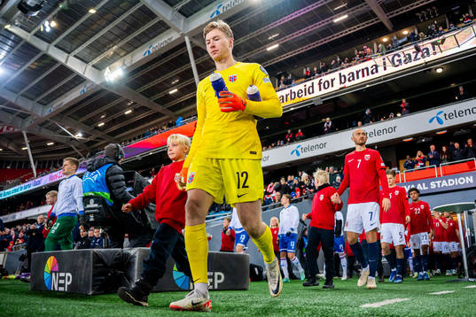 Goalkeeper Mathias Dyngeland of Norway enters the pitch