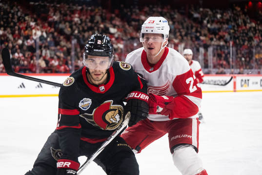 Artyom Zub of Ottawa Senators and Lucas Raymond of Detroit