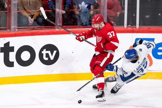 J.T. Compher of Detroit Red Wings and William Lagesson of
