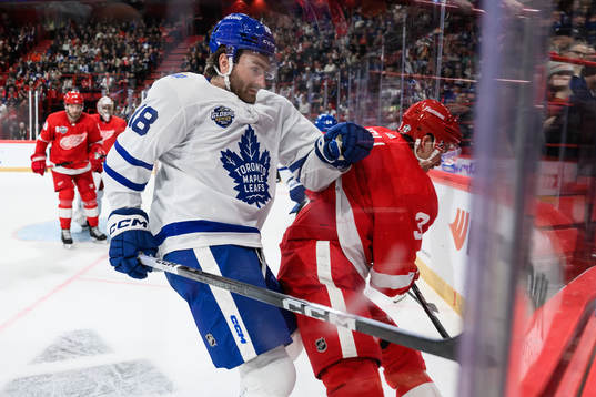 Noah Gregor of Toronto Maple Leafs and Justin Holl of