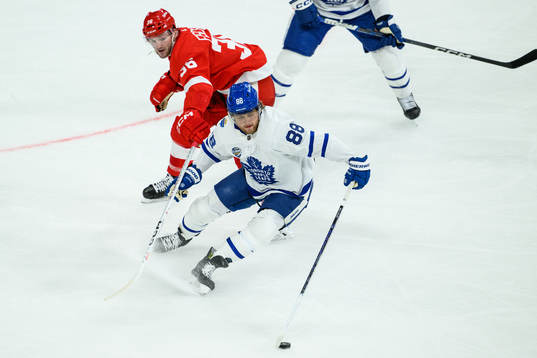 Christian Fischer of Detroit Red Wings and William Nylander