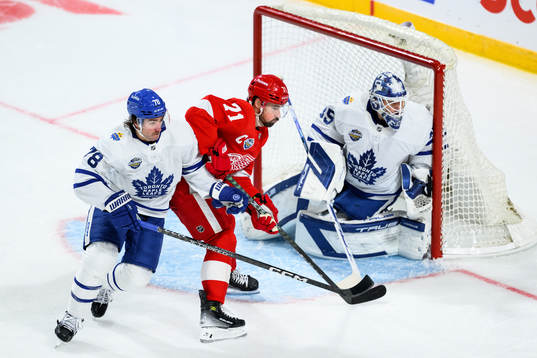 TJ Brodie and goalkeeper Ilya Samsonov of Toronto Maple