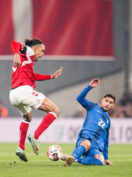 Yussuf Poulsen of Denmark and Adam Cerin of Slovenia
