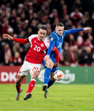 Yussuf Poulsen of Denmark and Timi Elsnik of Slovenia
