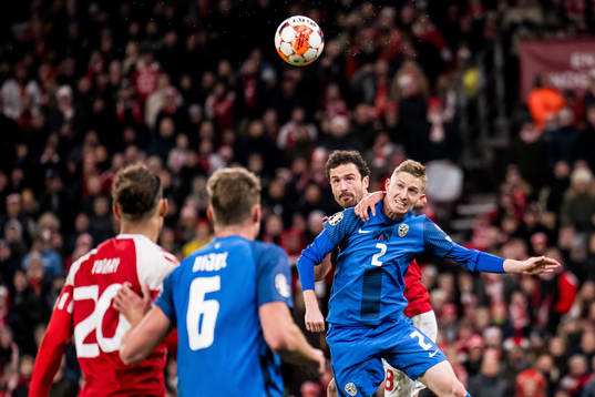 Thomas Delaney of Denmark and Zan Karnicnik of Slovenia