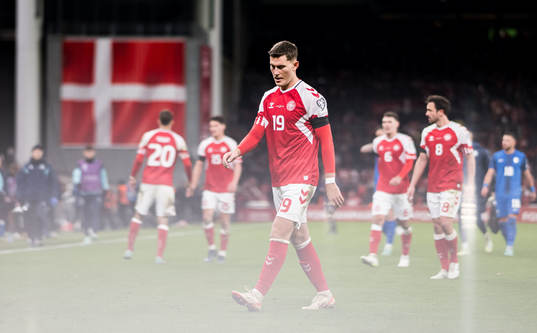Jonas Wind of Denmark looks dejected