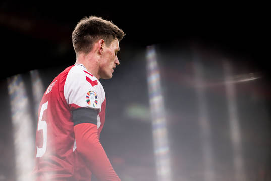 Joakim Mæhle of Denmark looks dejected