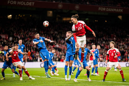 Yussuf Poulsen of Denmark and Miha Blazic of Slovenia