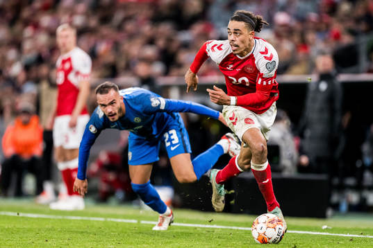 Yussuf Poulsen of Denmark and Vanja Drkusic of Slovenia