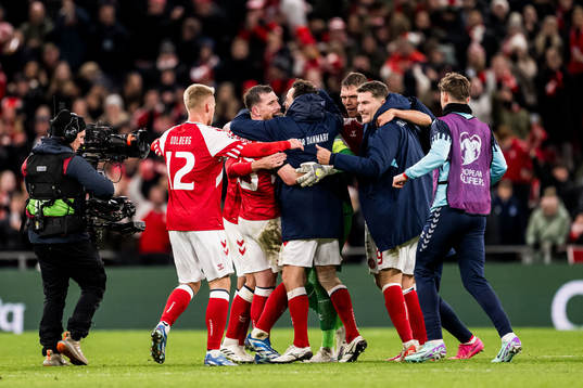 Players of Denmark celebrate