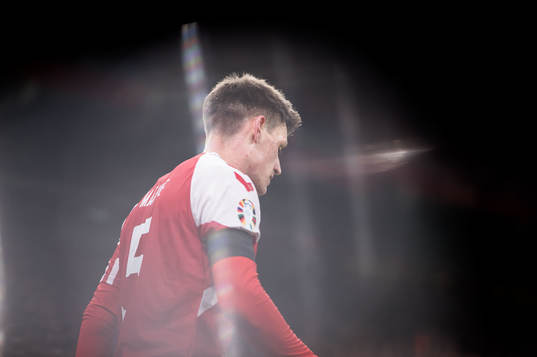 Joakim Mæhle of Denmark looks dejected