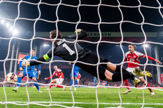 Goalkeeper Jan Oblak of Slovenia makes a save against
