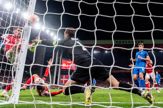 Joakim Mæhle of Denmark against goalkeeper Jan Oblak of