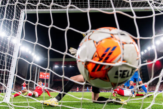 Joakim Mæhle of Denmark scores the 1-0 goal against