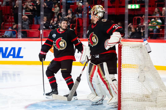 Erik Brännström of Ottawa Senators and goaltender Anton