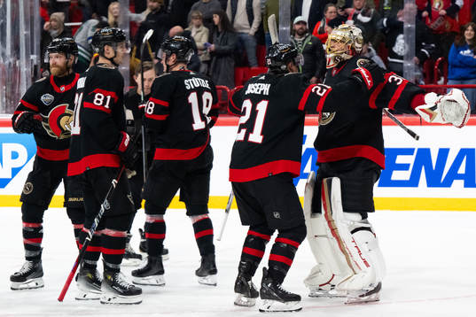 Mathieu Joseph of Ottawa Senators and goaltender Anton