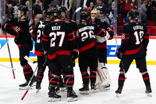 Erik Brännström of Ottawa Senators and goaltender Anton